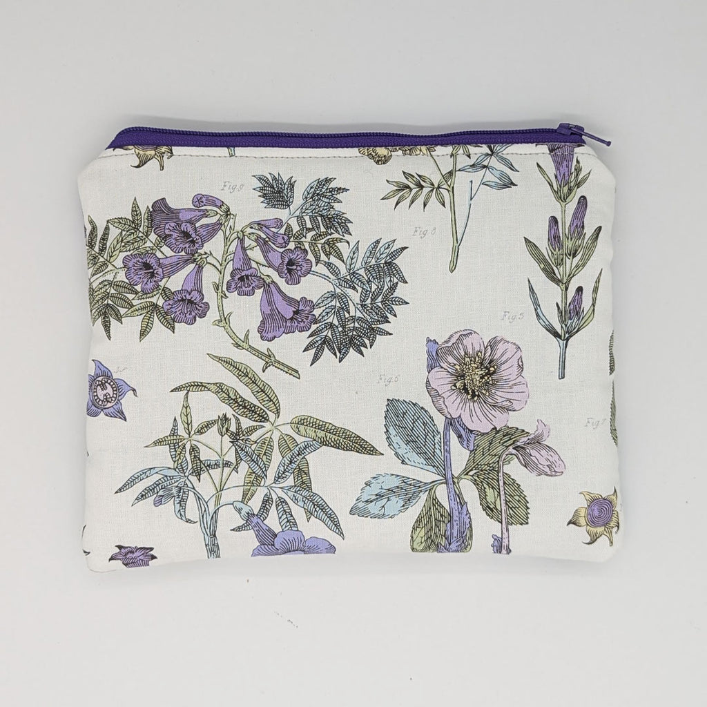Floral patterned pouch with a zipper on a white background