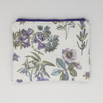 Floral patterned pouch with a zipper on a white background
